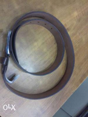 Brown Leather And Silver Buckle Belt