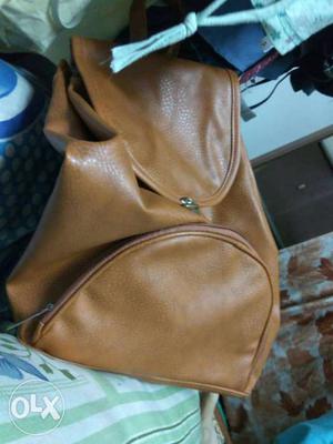 Brown Pebble Leather Bucket Bag