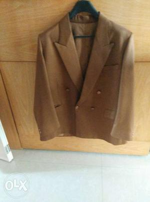 Brown colour (2 piece) suit. single piece