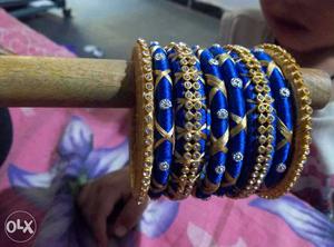 Gold-colored And Blue Silk Thread Bangles