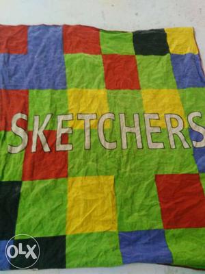 Green, Blue, Red, And Black Sketchers Textile