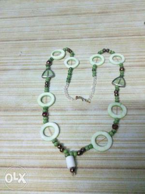Green, White, And Silver Beaded Necklace