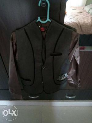 Men's Gray And Black Vest And Brown Dress Shirt