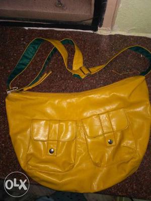 New yellow leather bag bought in US