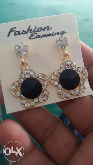 Pair Of Gold With Diamond Star Earrings