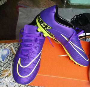 Pair Of Purple-and-green Nike Cleats With Box