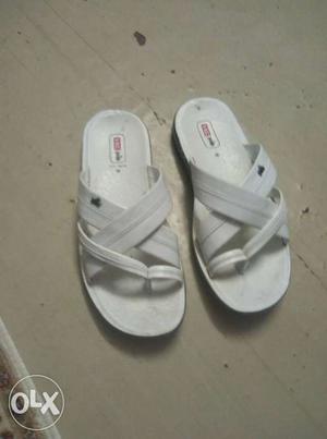 Pair Of White Leather Slip-on Sandals