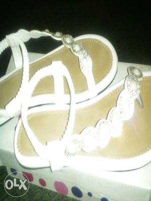 Pair Of White Sandals