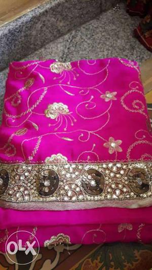 Pink And Brown Floral Textile