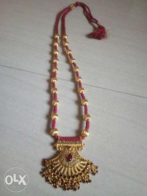 Red And Gold Pendant Necklace