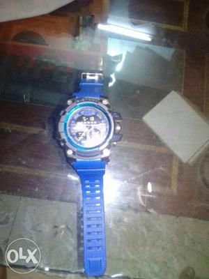Round Blue And Black Chronograph Watch