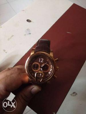 Round Gold Geneva Chronograph Watch With Brown Leather Strap