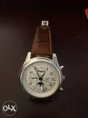 Round Silver And White Chronograph Watch With Brown Leather