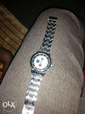 Round Silver Bezel White Face Chronograph Watch With Silver