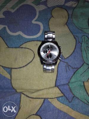 Round Silver Chronograph Watch With Silver Linked Bracelet