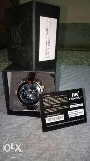 Round Silver IIK Collection Chronograph Watch With Silver