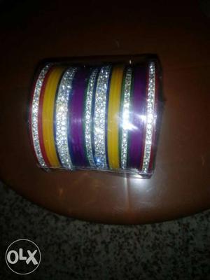 Silver And Yellow Bangles