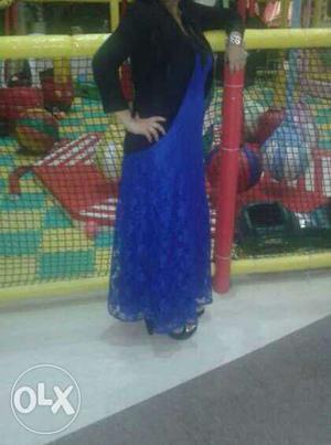 This a net gown of blue colour without this black