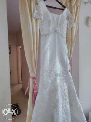 Wedding gown for sale in good condition. Attached
