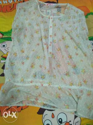 White And Yellow Floral Sleeveless Shirt