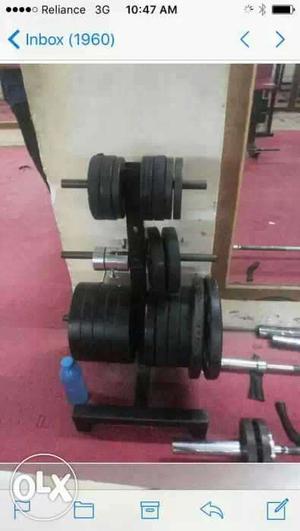 Black Barbell And Dumbbell Plates Lot