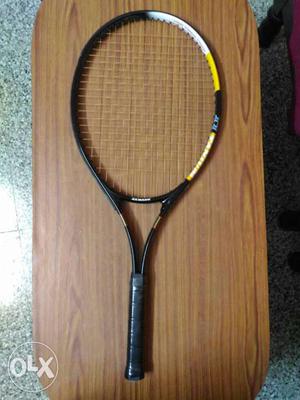 Black Handled Tennis Racket