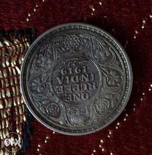 Old silver coin of Emperor George V Rule in 
