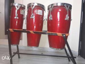 Red And Stainless Steel Conga Drums