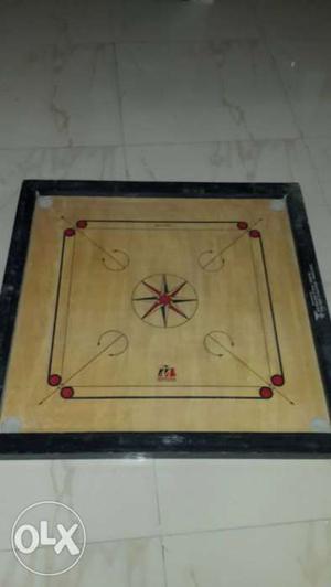 Set of two carrom boards.1 is unused and another