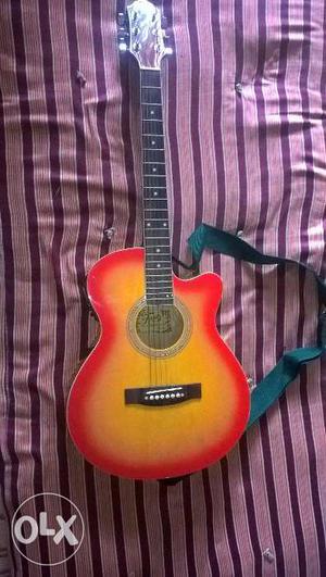 Trinity guitar two months old with bag and three