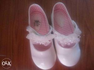 Beautiful white unused party wear girls shoes.