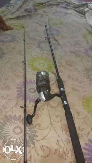 Black And Grey Fishing Rod or rell fix peris  ma