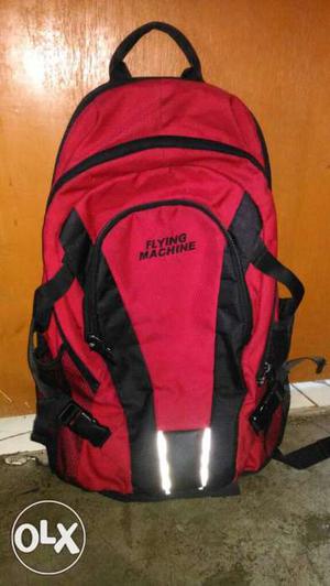 Black And Red Flying Machine Backpack with 3 compartments