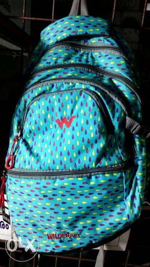 Blue, Green, And Purple Canvas Backpack