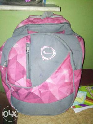 Gray And Pink Nike Backpack