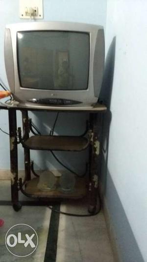 LG 20inch colour TV with TV trolly in a very good