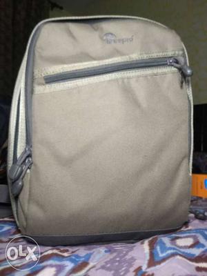Lowepro Traveller 150 Dslr bag; very compact and