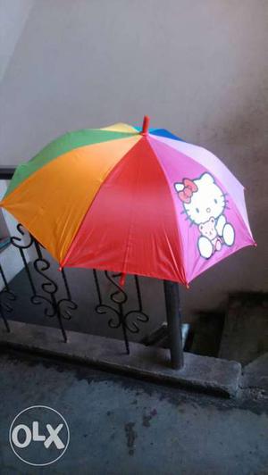 Red, Pink, Blue, And Yellow Hello Kitty Umbrella