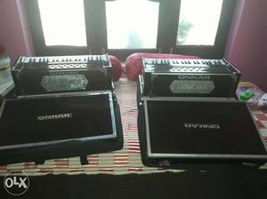 Two Black Onkar With Boxes