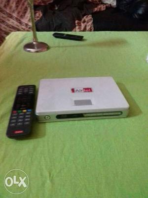 White Airtel i p tv box with remote