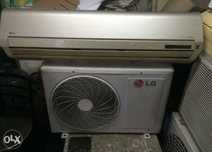 White LG Split Type And Outdoor AC Units