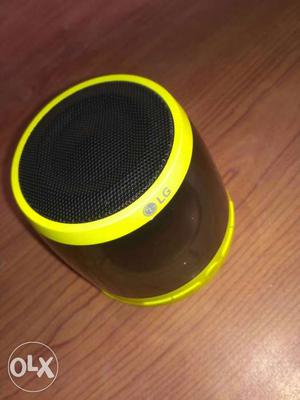 Yellow And Black LG Bluetooth Speaker