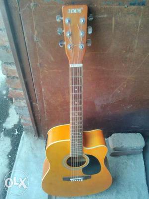 Brand new YAMAHA golden colour multi and Acoustic Guitar
