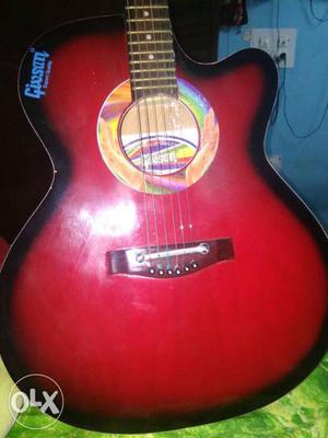 Givson Black And Red Cutaway Acoustic Guitar 3 month old