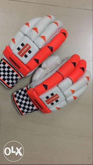 Pair Of White And Orange Leather Soccer Gloves