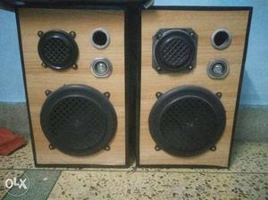 Two Brown And Black Stereo Speakers