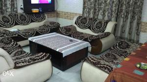 A beautiful 9 seater sofas with covers