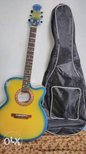 Acoustic Signatere Guitar With Bag and Picks..