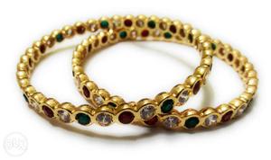 Bangles with rich gold and shiny stone look with a very fair