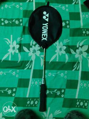 Black And Silver Yonex Badminton Racket With Black Case